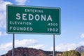 Sedona,Arizona, road sign with red rock mountain landscape Royalty Free Stock Photo