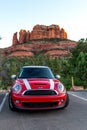 SEDONA, ARIZONA / US - August 10, 2019: Red Mini Cooper S with White Racing Stripes Parked in Sedona, Arizona