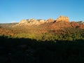 Sedona At Sunset With Vivid Rock Formations And Deep Shadows