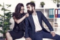 Seductive colleague. Flirting with boss. Man and woman business colleagues. Office flirt. Career company. Office couple Royalty Free Stock Photo