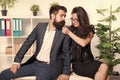 Seductive colleague. Flirting with boss. Man and woman business colleagues. Office flirt. Career company. Office couple Royalty Free Stock Photo