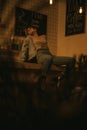 Seductive girl sitting on bar Royalty Free Stock Photo