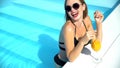 Seductive lady flirting enjoying cocktail in swimming pool, all inclusive resort Royalty Free Stock Photo