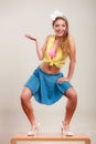 Seductive pin up woman girl dancing on table. Royalty Free Stock Photo