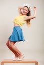 Seductive pin up woman girl dancing on table. Royalty Free Stock Photo