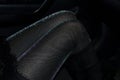 Seductive slender female legs in shiny pantyhose in the dark Royalty Free Stock Photo