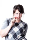 Seductive young woman with a cherry Royalty Free Stock Photo