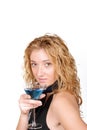 Seductive young woman holding a Martini glass Royalty Free Stock Photo