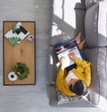 See life from a different angle. a young woman using a laptop at home.