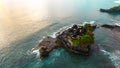 See Orange Of The Sun Above The Blue Water From Tanah Lot