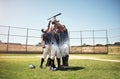 See what happens when you play as a team. a group of young baseball players celebrating after winning a game. Royalty Free Stock Photo