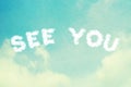 SEE YOU cloud text on grunge retro cloudy sky background Royalty Free Stock Photo