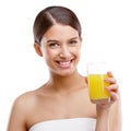 See that youre getting enough vitamin C. Studio portrait of an attractive young woman holding a glass of orange juice. Royalty Free Stock Photo