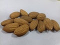 Seed of almond nuts over white