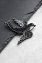 Seed bead embroidered brooch in a shape of black swallow bird