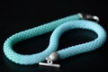 Seed bead necklace aquamarine color on a dark background Royalty Free Stock Photo