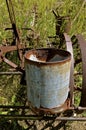 Seed canister of an old corn planter Royalty Free Stock Photo