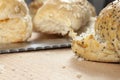 Seeded bread rolls laying on a kitchen worktop Royalty Free Stock Photo