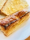 Sausage roll with bread and butter Royalty Free Stock Photo