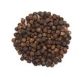 The seeds of black pepper, a heap, top view on a white background, close-up Royalty Free Stock Photo