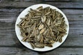 seeds of the sunflower (Helianthus annuus), Types are linoleic, high oleic and sunflower oil seeds, a snack