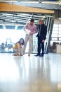 Seeing the bigger picture. Full length shot of three businesspeople looking over some paperwork.