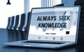 Always Seek Knowledge - on Laptop Screen. Closeup. 3D.