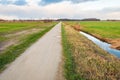 Seemingly endless straight path in a rural landscape Royalty Free Stock Photo