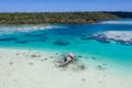 Aerial of Fishing Shack and Coral Reefs in Indonesia Royalty Free Stock Photo