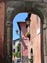 Arc with colored houses to Isola Farnese in Italy. Royalty Free Stock Photo