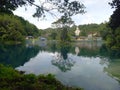 Seen from a distance housing and houses of worship adorn the beautiful view of Lake Uter Royalty Free Stock Photo