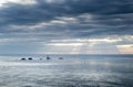 Shafts of sunlight shining through clouds at sunset,Land`s End,Cornwall,England,UK Royalty Free Stock Photo