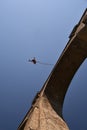 Young man bungee jumper hanging on a cord Royalty Free Stock Photo