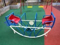 seesaw Children play area, playground in the park Royalty Free Stock Photo