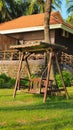 Wooden seesaw swing for the resting in the garden