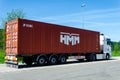 Seevetal, Germany - May 09, 2022: HMM cargo container transportation on truck. HMM Co., Ltd. formerly known as Hyundai Merchant