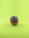 Fresh red apples on a yellow background Royalty Free Stock Photo