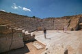 Some tourists visit the ruins of the ancient Greek theater of Se Royalty Free Stock Photo