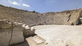 Some tourists visit the ruins of the ancient Greek theater of Se Royalty Free Stock Photo