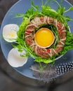 Segg in a nest with herbs and broken eggshell Royalty Free Stock Photo
