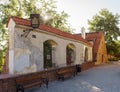 The segment of old castle wall and house inside the wall in old town Warsaw