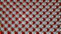 segmented silvery-red spheres. abstract three-dimensional background. 3d render