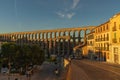 Segovia, Spain, October 19, 2021. View of the aqueduct of Segovia, with the statue of the Devil of Segovia Royalty Free Stock Photo
