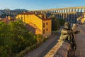 Segovia, Spain, October 19, 2021. View of the aqueduct of Segovia, with the statue of the Devil of Segovia Royalty Free Stock Photo