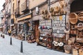 Souvenir shop display on a narrow medieval street, Segovia, Spain.