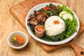 Sei sapi served on round plate Royalty Free Stock Photo