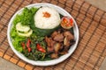 Sei sapi served on round plate Royalty Free Stock Photo