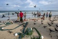 Seine fishermen pull their fishing nets from the Indian Ocean onto Uppuveli beach in Sri Lanka. Royalty Free Stock Photo