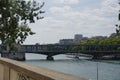 A bridge over the Parisian Seine - Seen from afar Royalty Free Stock Photo