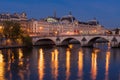 Seine River banks and Orsay Museum at daybreak. Paris, France